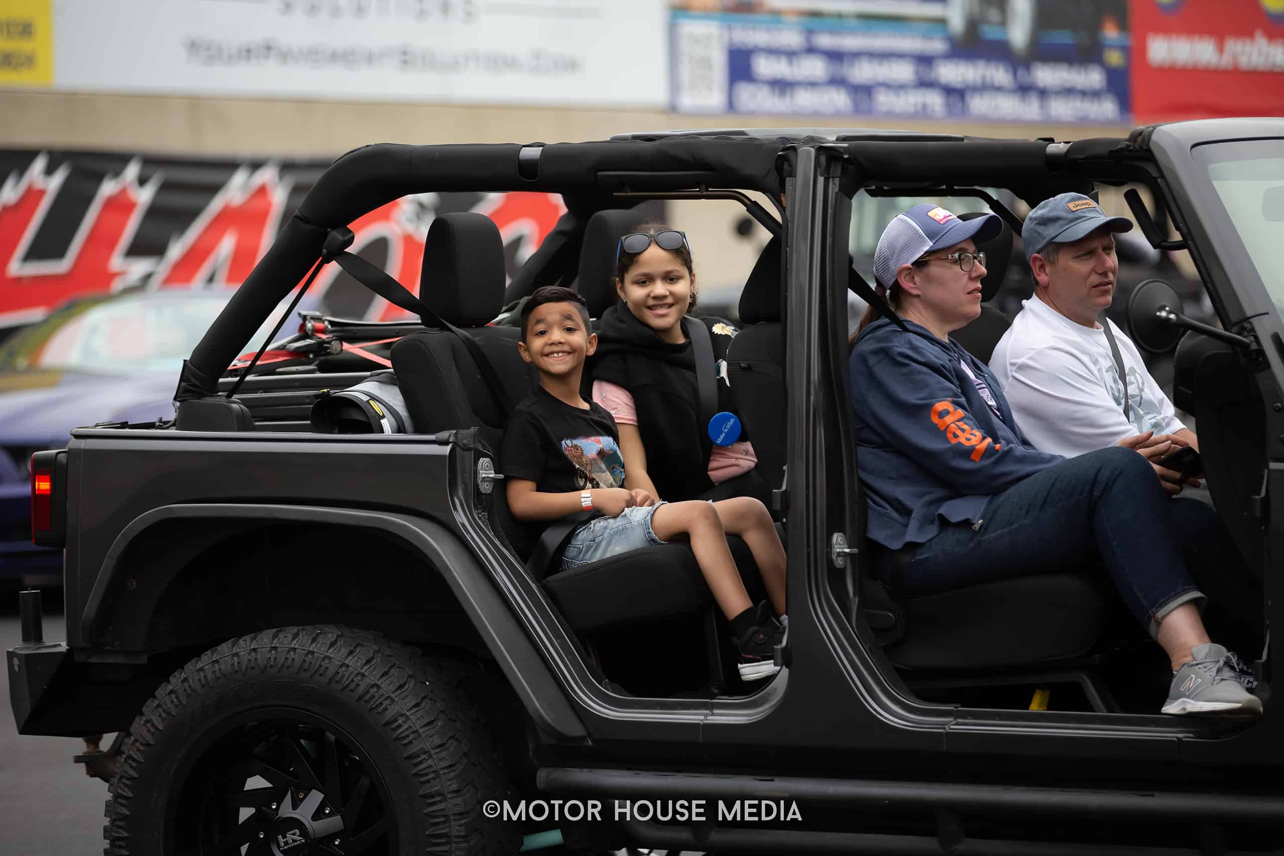 The Make a Wish parade at The Turn 5 auto show featuring Cars, trucks & Jeeps